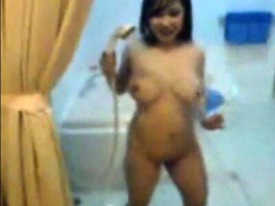 busty indonesian babe playing her boobs and in shower - drtuber.com