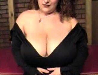 Brunette MILF Barbara showing off her big boobs - drtuber.com